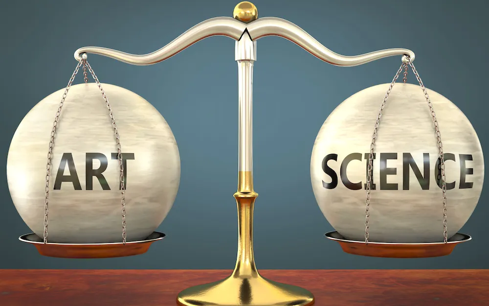 A set of scales with a ball on one side reading “Art” and a ball on the other side reading “Science”